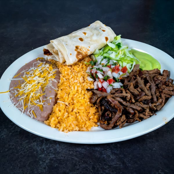 A Highlands D'Leon's Mexican plate with a burrito, rice, beans, steak, pico de gallo, and guacamole.
